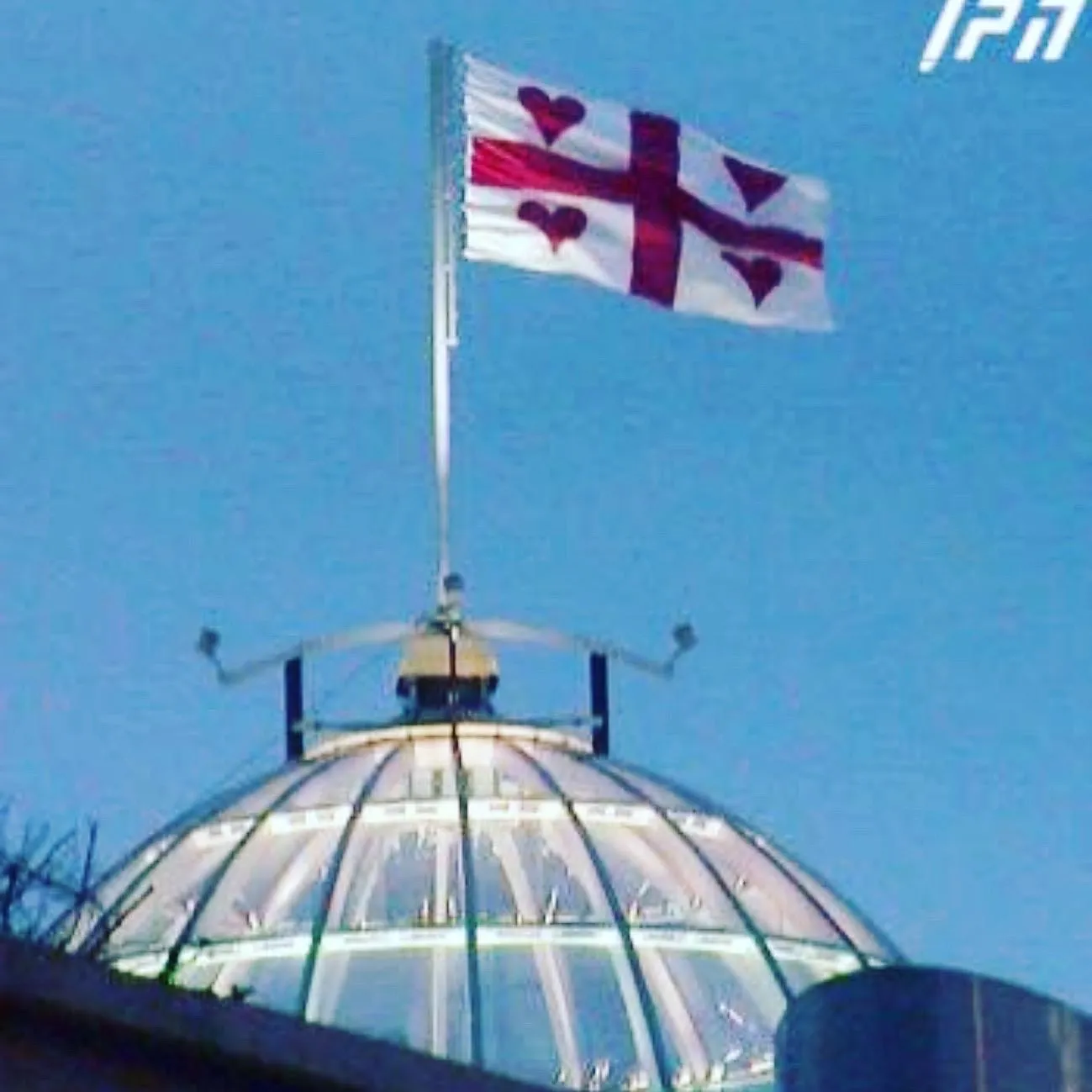 Cover image of Flag of Georgia on the roof of the presidential palace by Tsouladze Guela, a State symbolic design, based in Tbilisi