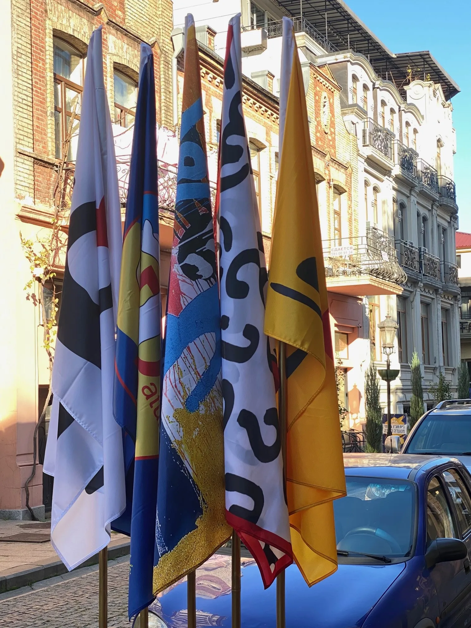 Image of Flag of Georgia on the roof of the presidential palace by Tsouladze Guela, a State symbolic design, based in Tbilisi